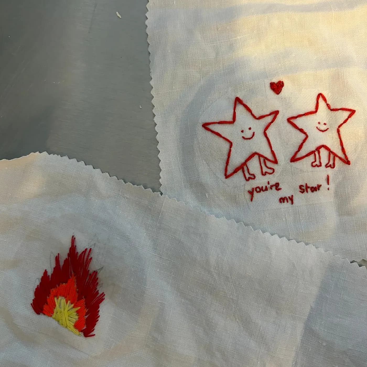 Broderie, deux étoiles et une flamme, embroidery made at Artichaut in Montmartre